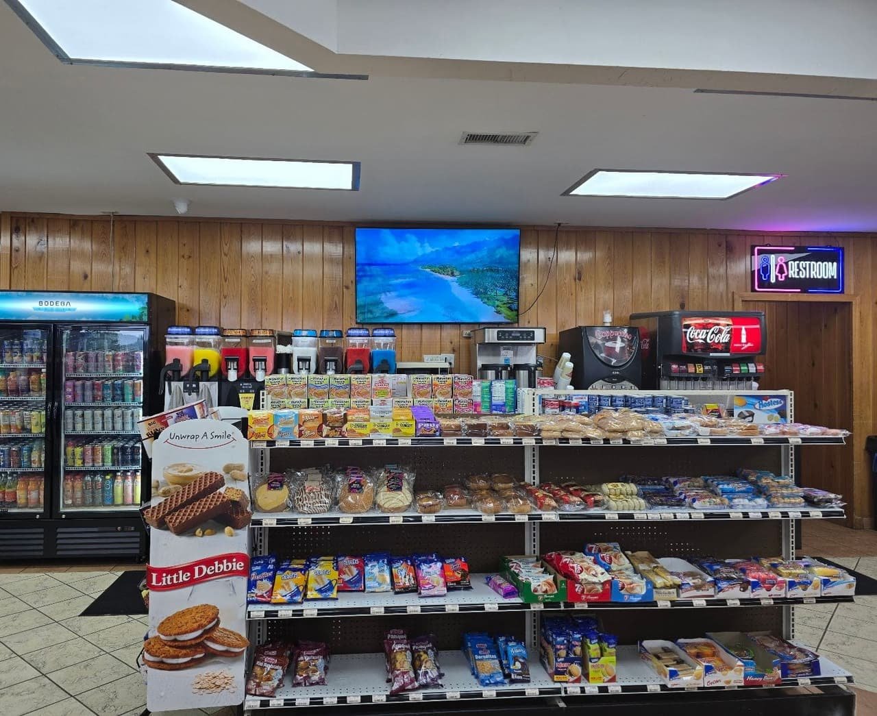 Coffee brewers, cappuccino machine, Coca-Cola fountain and the bakery shelf at Bent Creek Grocery